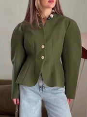 Green tailored puff sleeve blazer on model