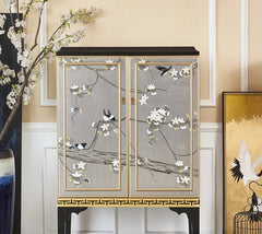 Decorative cabinet with floral design in a room setting