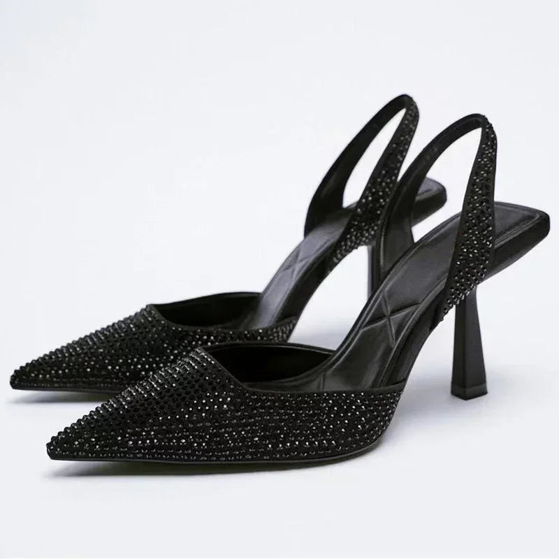 Black crystal slingback pointed toe pumps