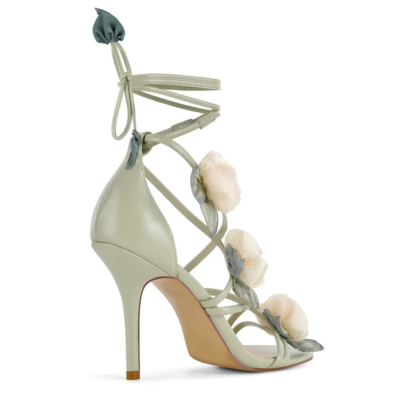 Sage green floral lace-up stiletto sandals, rear view