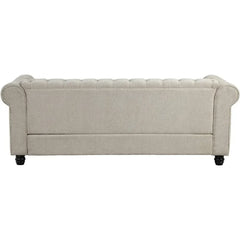 Beige sofa with tufted backrest on a white background