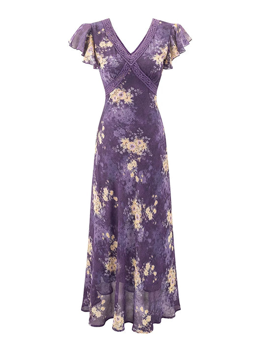 Purple floral print maxi dress with v-neckline and flutter sleeves, flat lay.