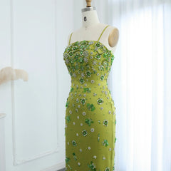  Mannequin displaying the green floral beaded midi dress, showcasing its elegant silhouette and feminine charm. Golden Atelier 4