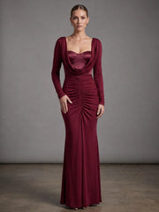 Back view of burgundy draped collar ruched gown dress.
