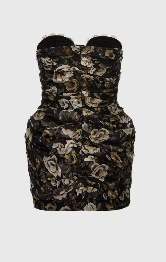 Floral patterned strapless dress on a white background