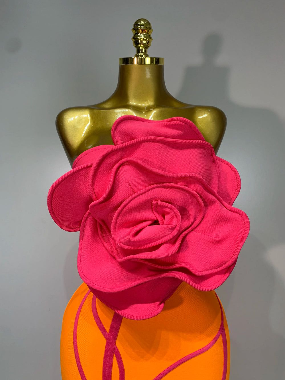 Close-up of floral applique on strapless sheath dress