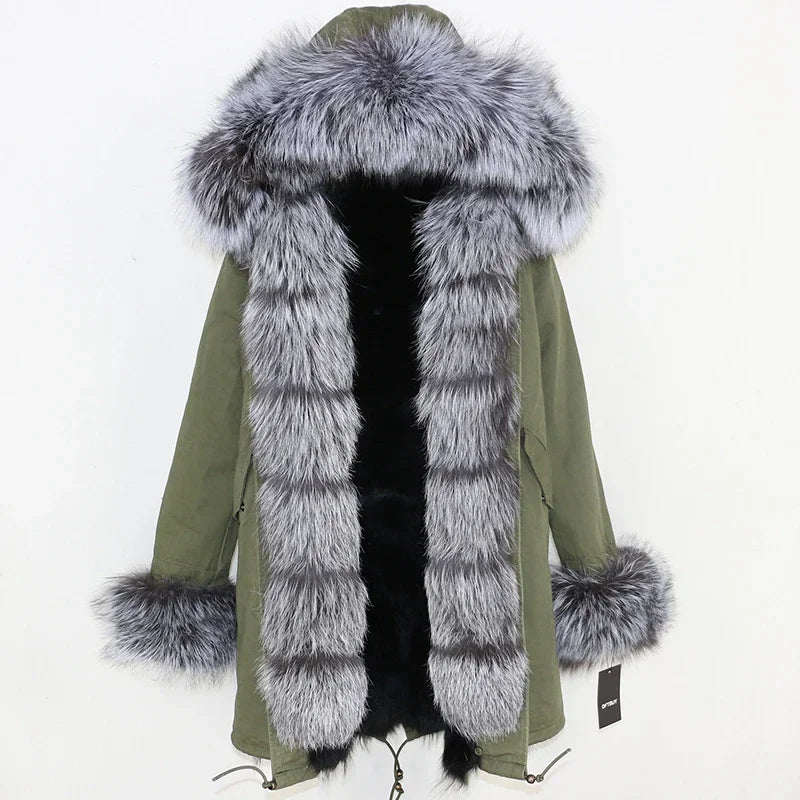 Green parka coat with large fur collar and cuffs on a white background
