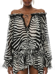 Close-up of zebra print off shoulder top neckline