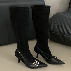  Women's knee-high boots with a comfortable stretch fabric.