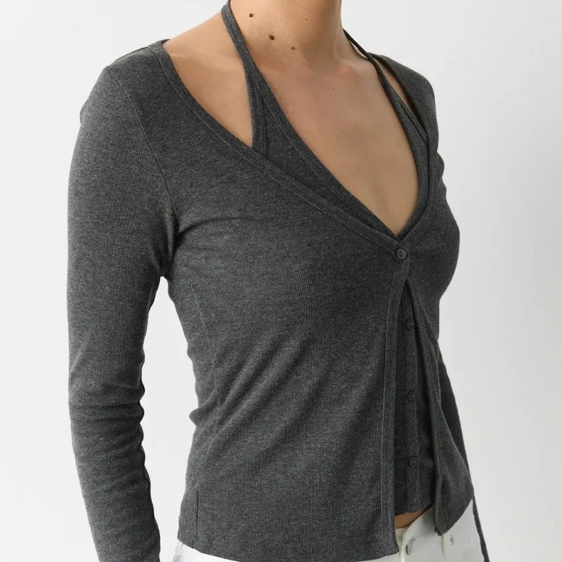 Gray long-sleeve top with a V-neck and knot detail on a white background