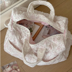 Quilted floral print duffle top, main compartment open