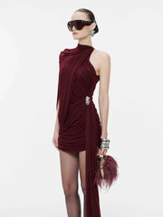 Woman wearing a burgundy dress with a white background