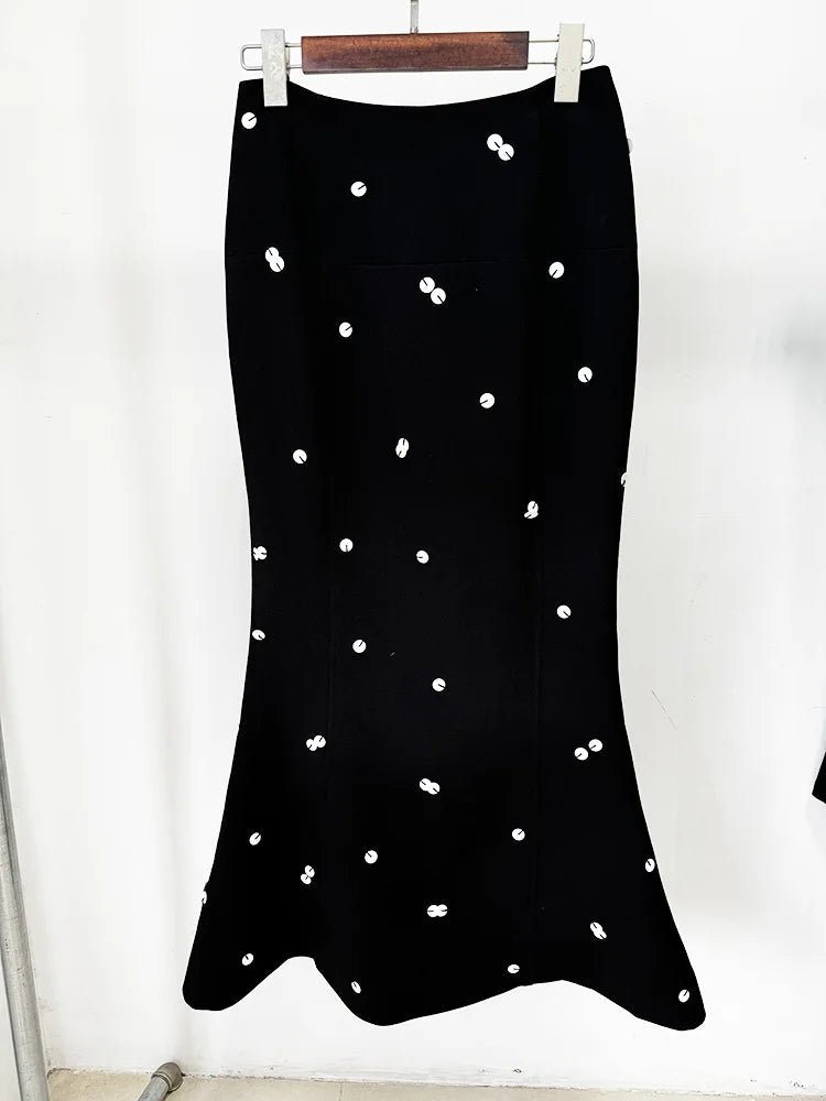 Black skirt with white button details 