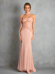 A model wearing a stylish pink twisted tube mermaid midi dress, showcasing its unique design. Golden Atelier 1