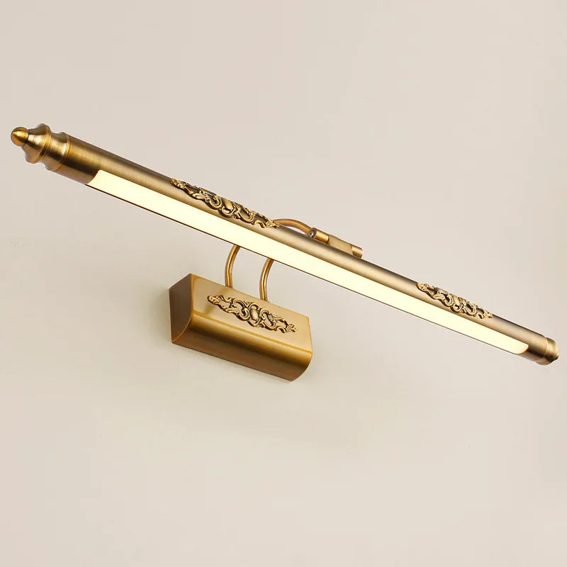 Gold carved retro LED mirror headlight with up & down wall lighting on beige background