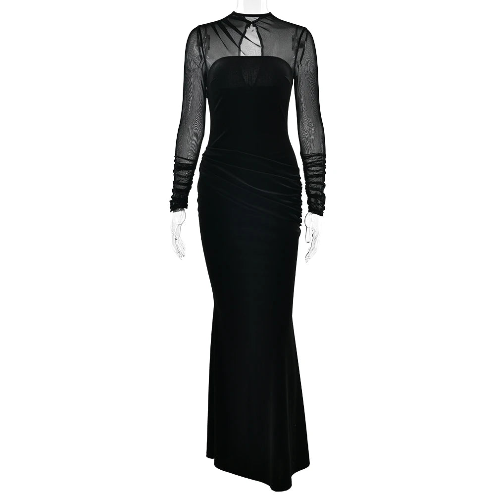 Black evening gown with sheer long sleeves on a white background