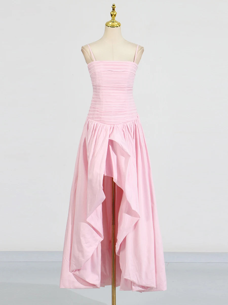 Pink strapless dress on a mannequin against a white background