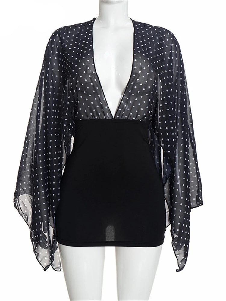 Polka dot v-neck flare sleeve mini dress on mannequin