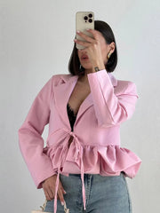 Cropped blazer with ruffled hem and lace-up waist detail
