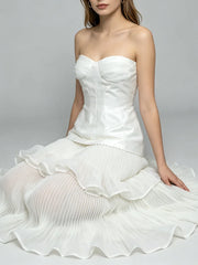Strapless pleated ruffle gown sitting detail