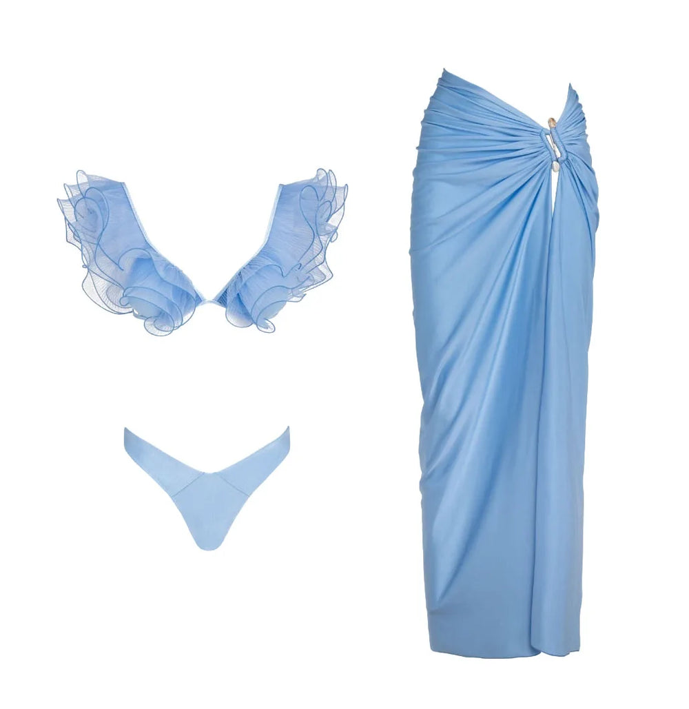 Blue ruffled V-neck bikini top and draped wrap skirt set.