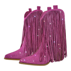 Pink fringed boots with rhinestones on a white background