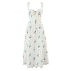 White dress with blue floral pattern on a white background