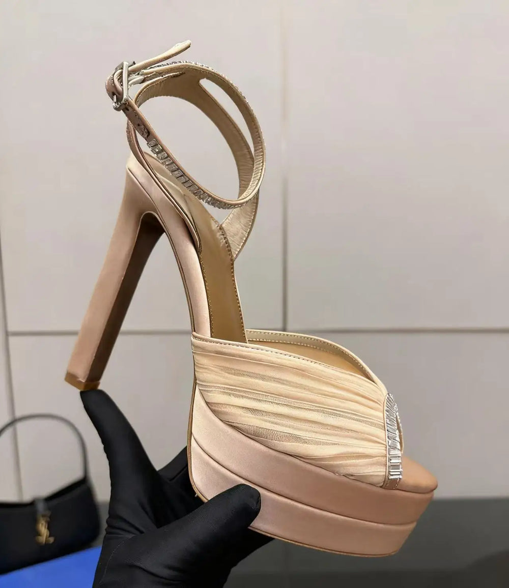 Apricot color platform rhinestone ankle strap heels, pleated satin upper, open toe.