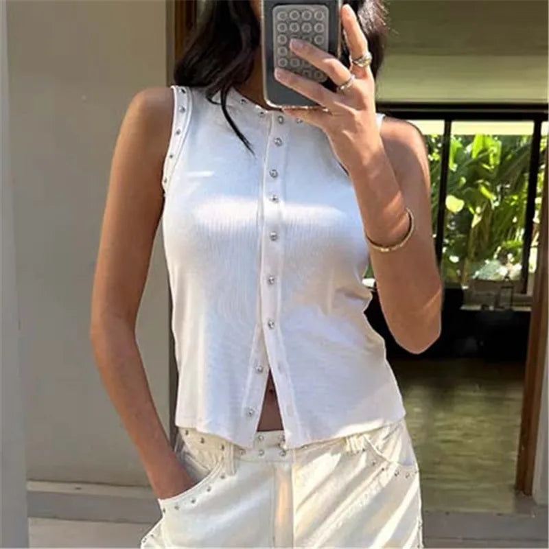 Model wearing a studded ribbed knit sleeveless top with button front