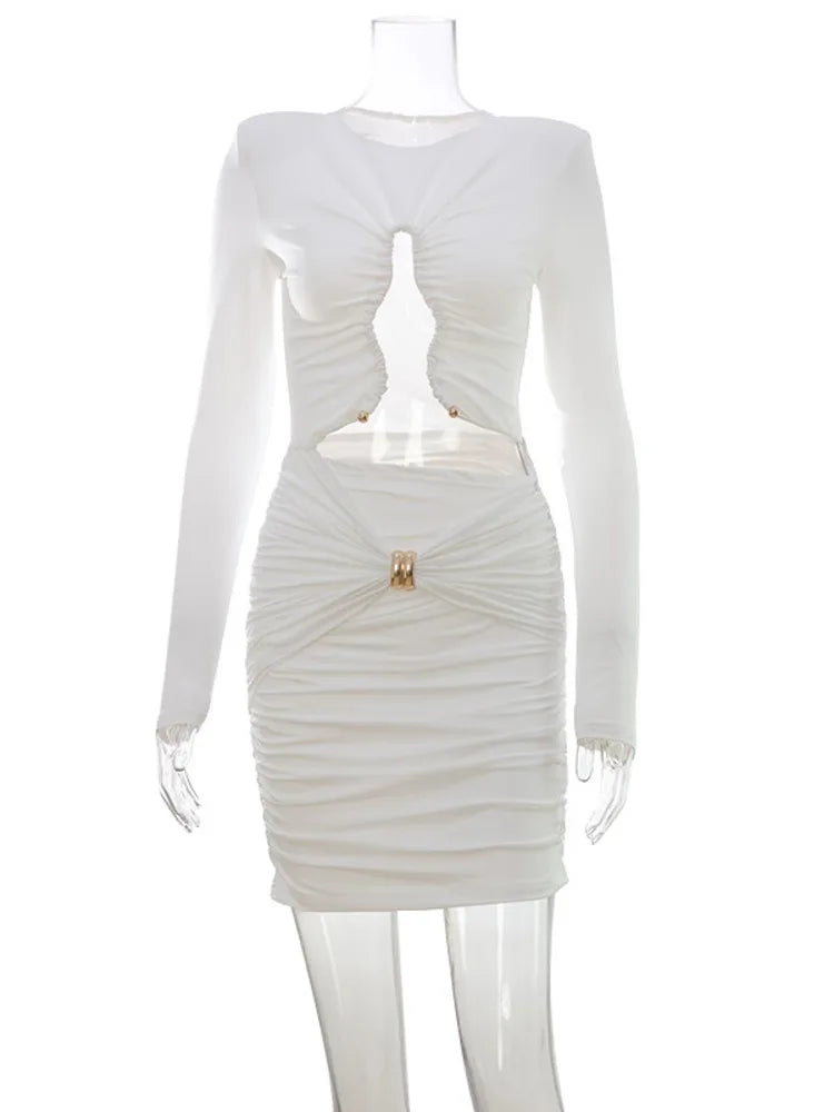 White long-sleeve dress with cut-out design on a white background