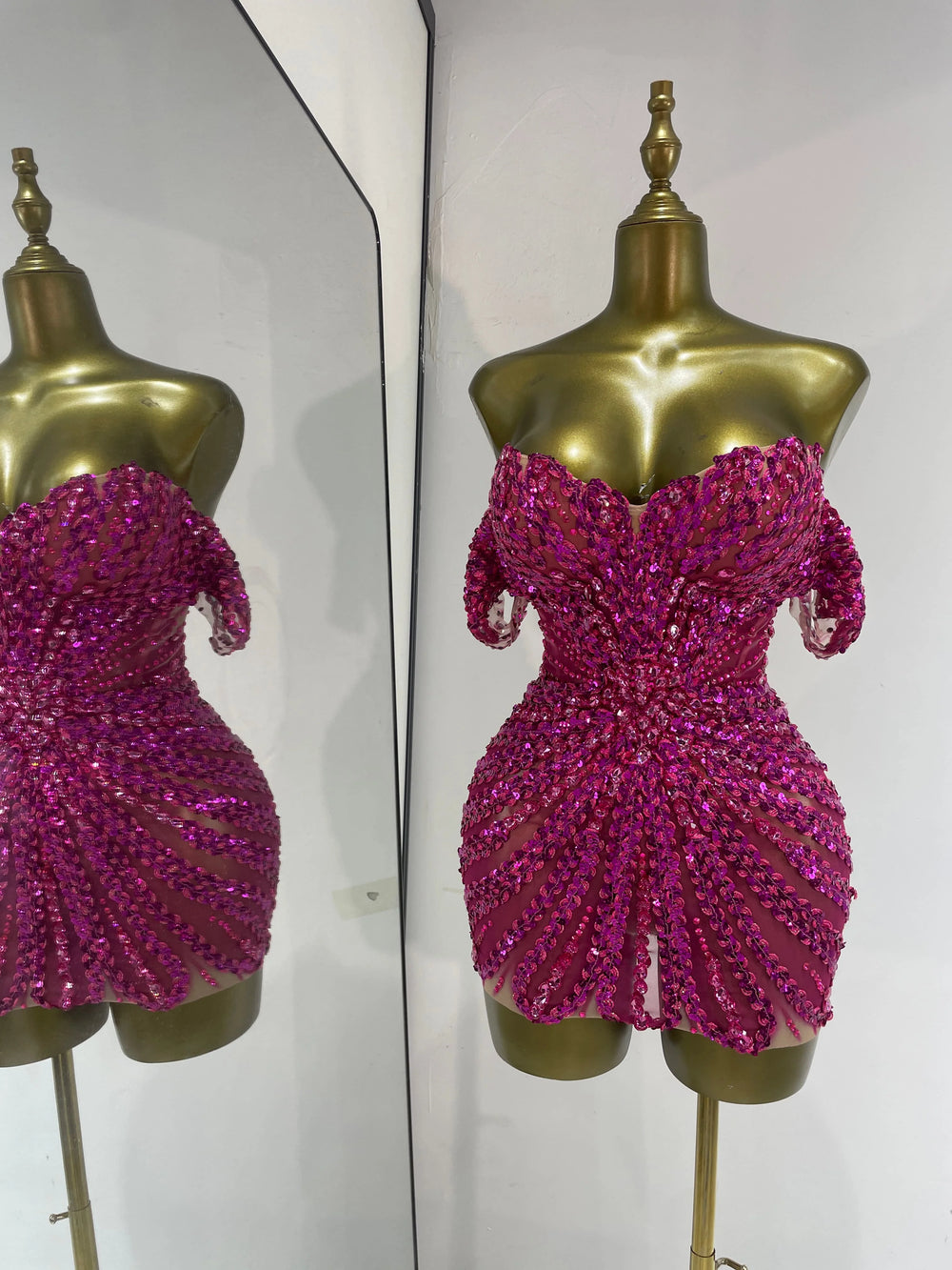 Sequin off-shoulder mini dress angled front view