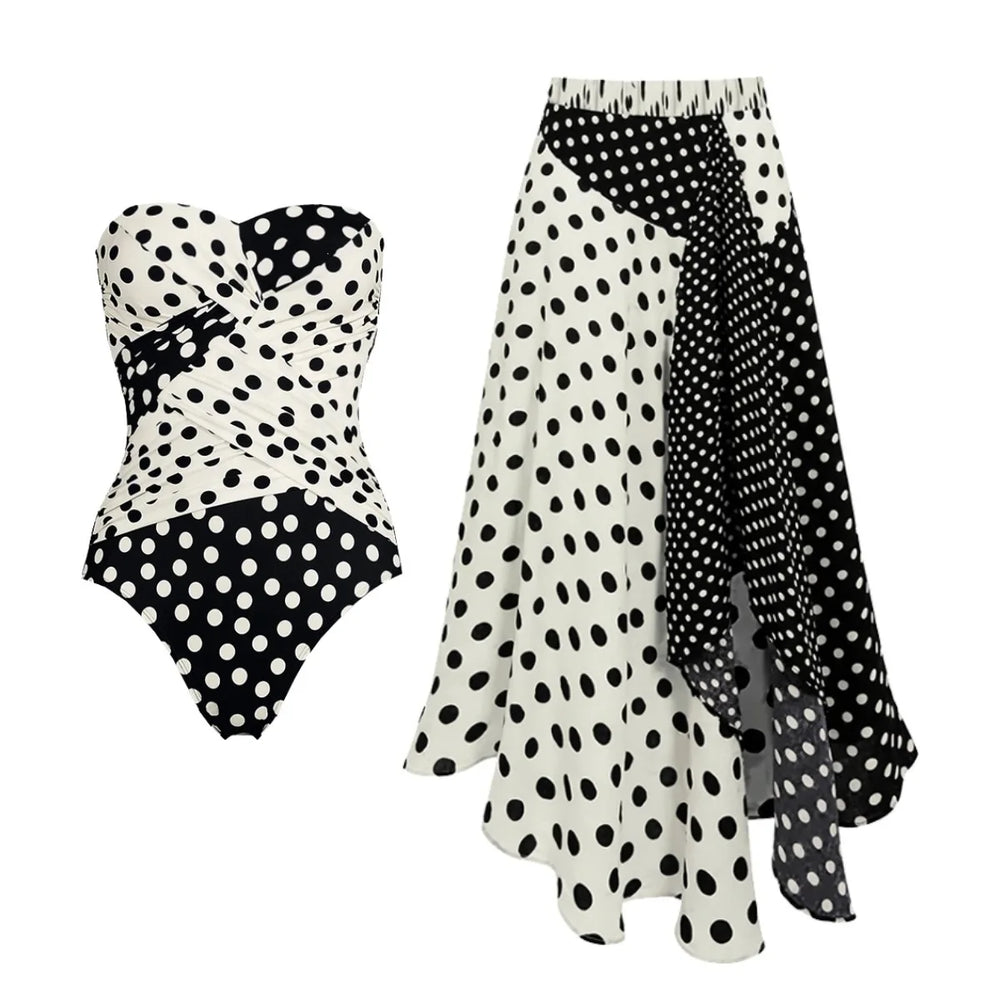 Polka dot strapless swimwear set with wrap detail and asymmetrical skirt.