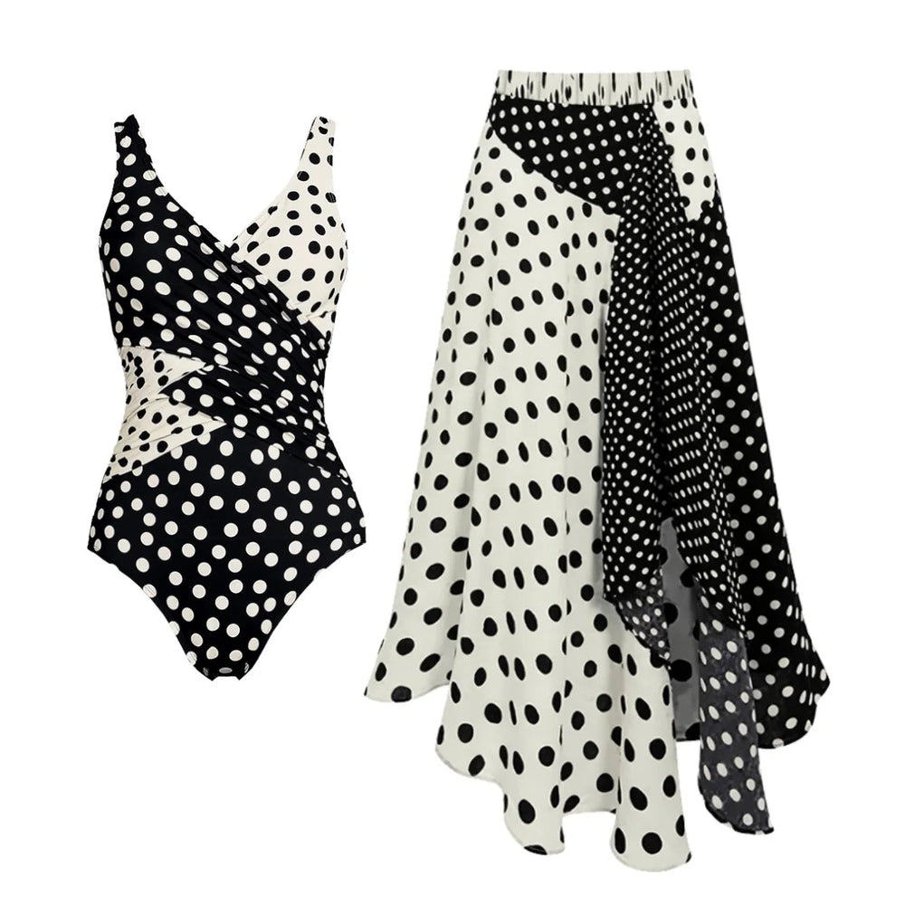 Polka dot one-piece swimwear set with wrap detail and asymmetrical skirt.