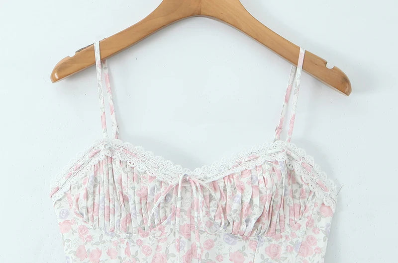 Close-up of the ruched bodice and lace trim on a midi dress