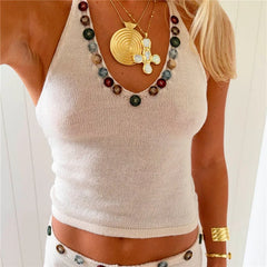 Front view of knit halter top with beaded detail