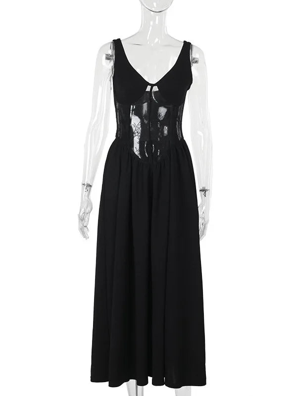 Black sleeveless dress on a mannequin against a white background