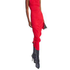 Red dress with black and white patterned high-heeled boots