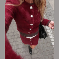  Women's fur coat and skirt set with long sleeves.