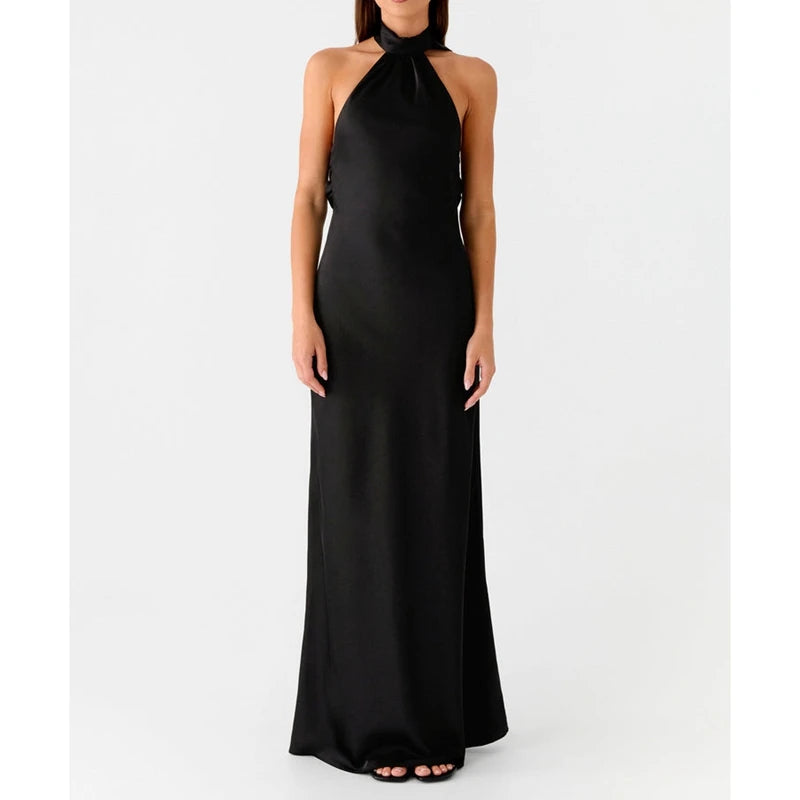 Black halter neck gown on a white background