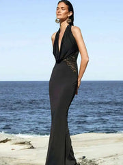 elegant black halter dress styled for evening wear
