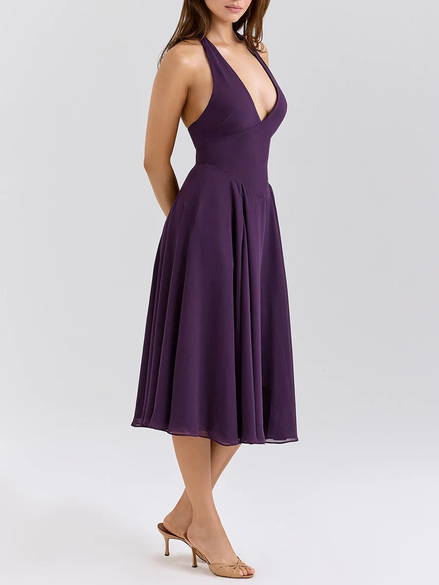 Purple dress worn by a model - halter neck