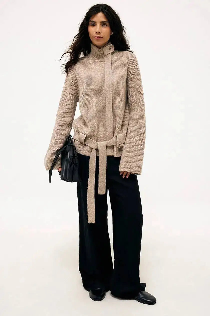 Ribbed knit belted turtleneck coat worn by model