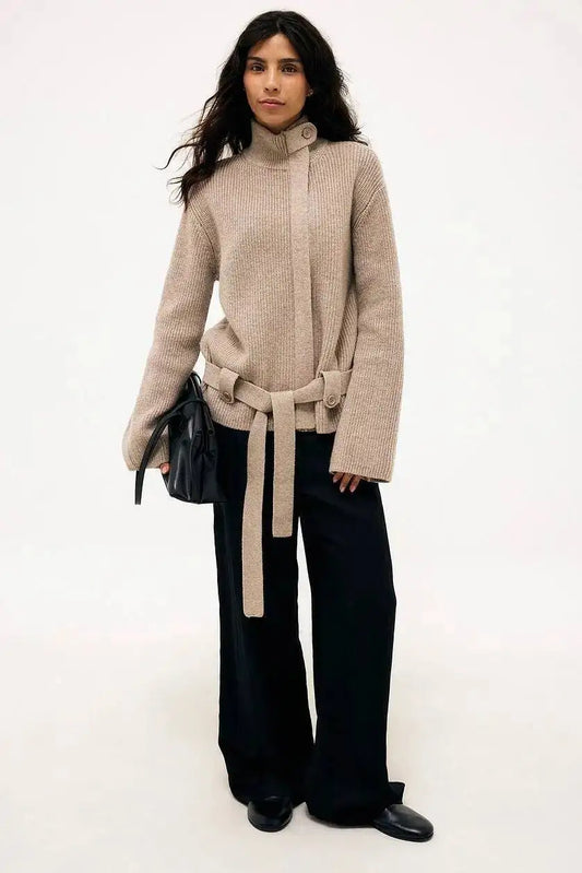 Ribbed knit belted turtleneck coat worn by model