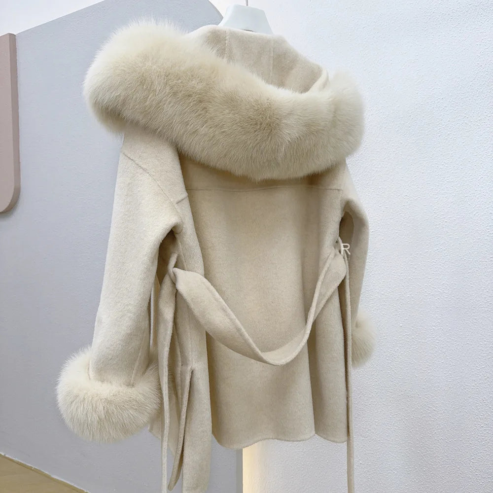 Beige coat with fur collar on a white background