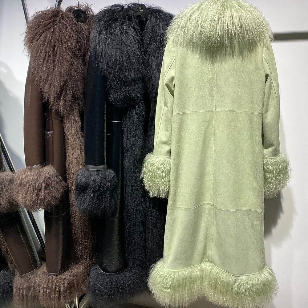 Light green coat with feathered trim on a rack with other coats.