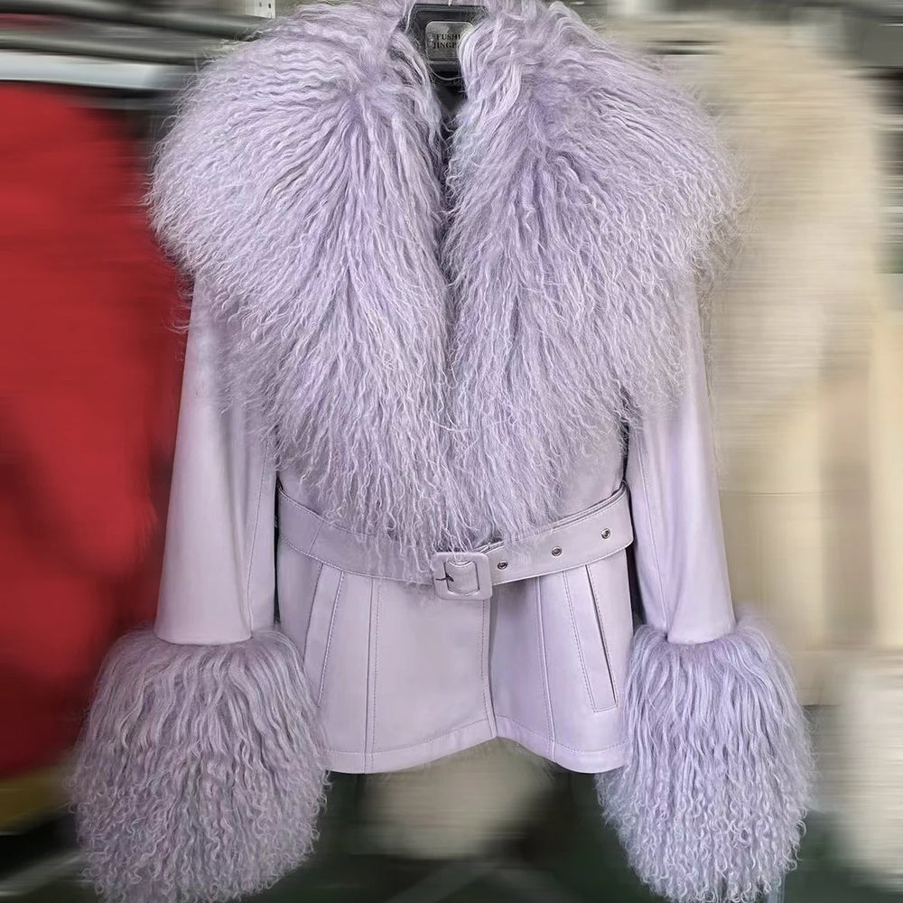 Light purple fur-trimmed coat with a belt on a hanger against a blurred background.