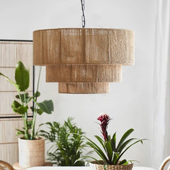 A cozy dining room illuminated by a natural rattan and hemp rope pendant lamp, creating an intimate atmosphere. 4