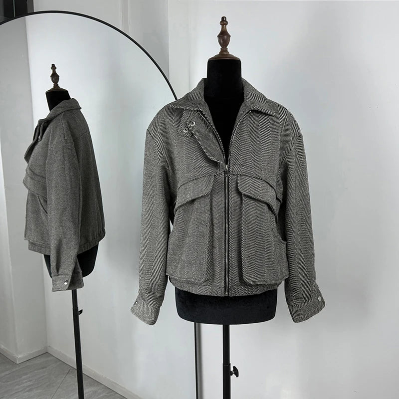 Gray jacket on a mannequin with a white background
