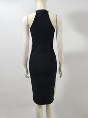 Black dress on a mannequin against a white background