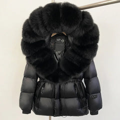 Hooded down jacket with a black fur trim.